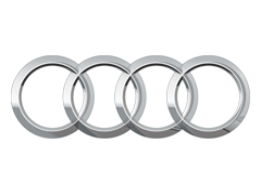 Silver Audi logo consisting of four interlocking rings on a neutral background.